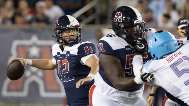 Feb 26, 2023; Houston, TX, USA; Houston Roughnecks quarterback Brandon Silvers (12) drops back to pass against the Arlington Renegades in the first quarter at TDECU Stadium. Mandatory Credit: Thomas Shea-USA TODAY Sports  